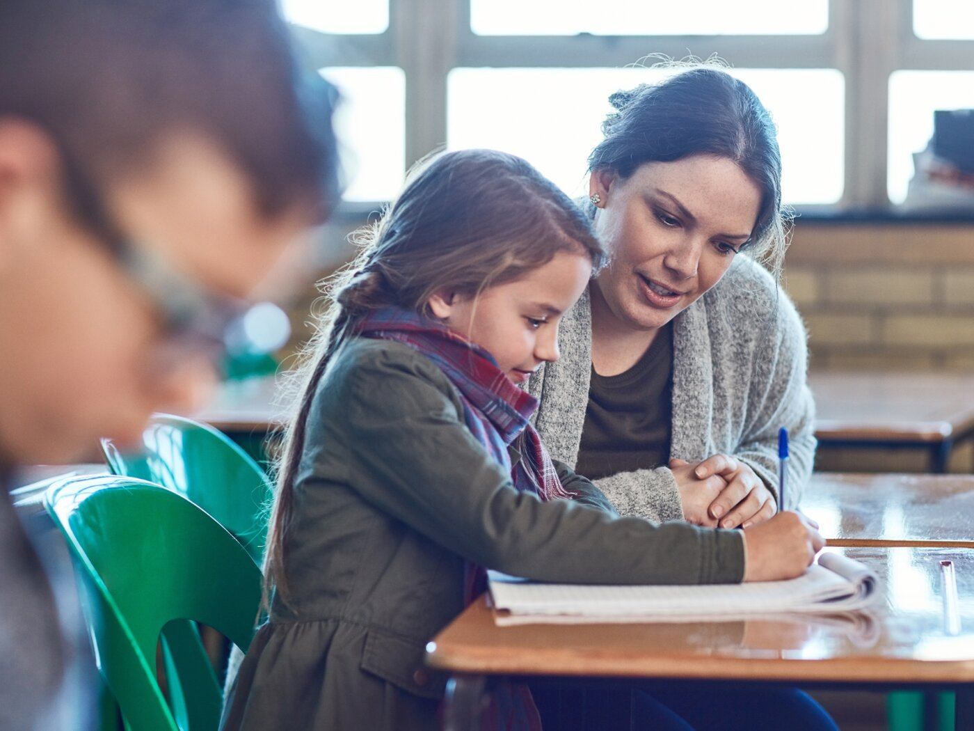 Teacher student writing