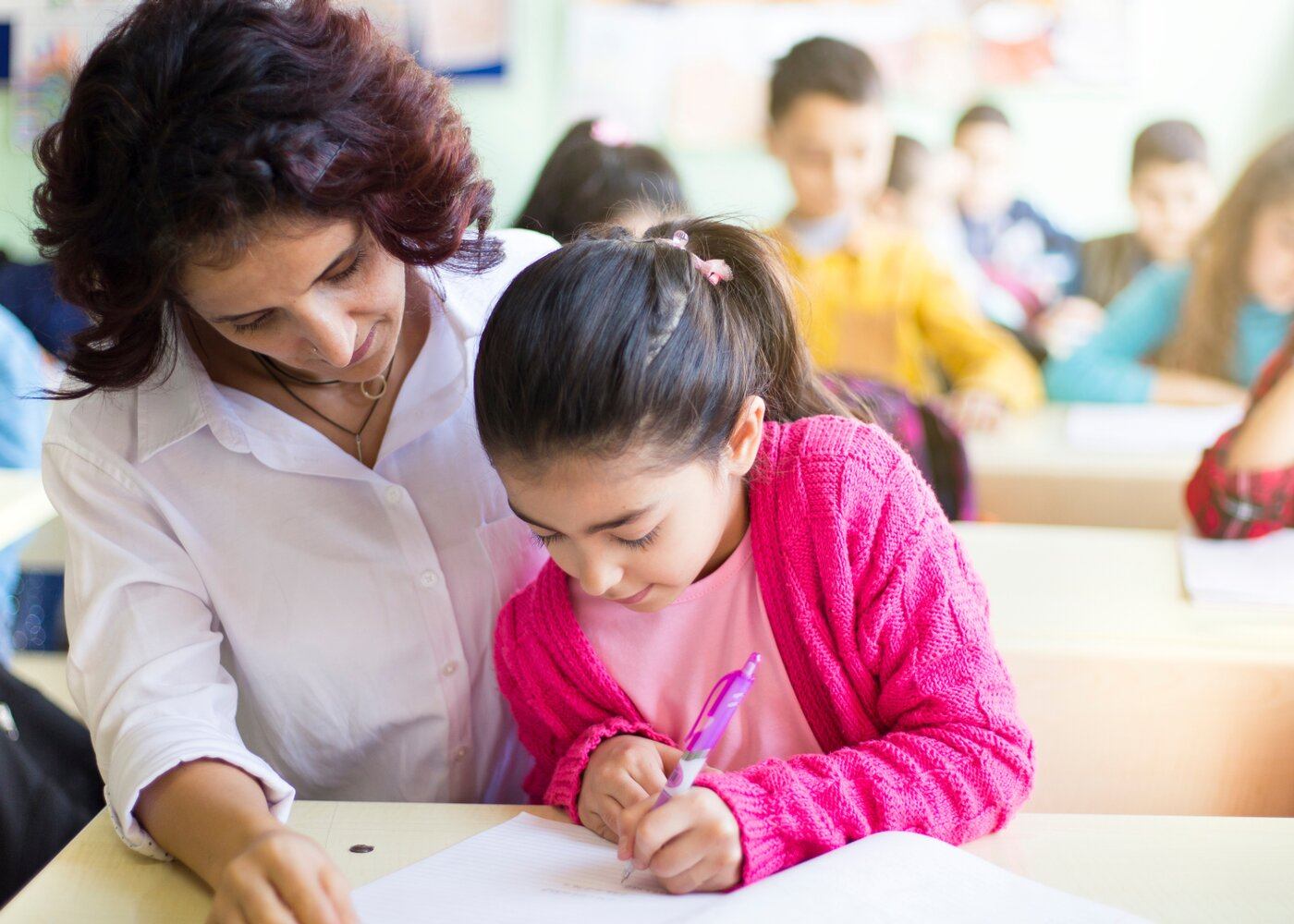 Teacher student writing ELA